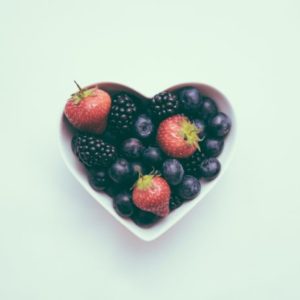 Heart-shaped bowl with berries